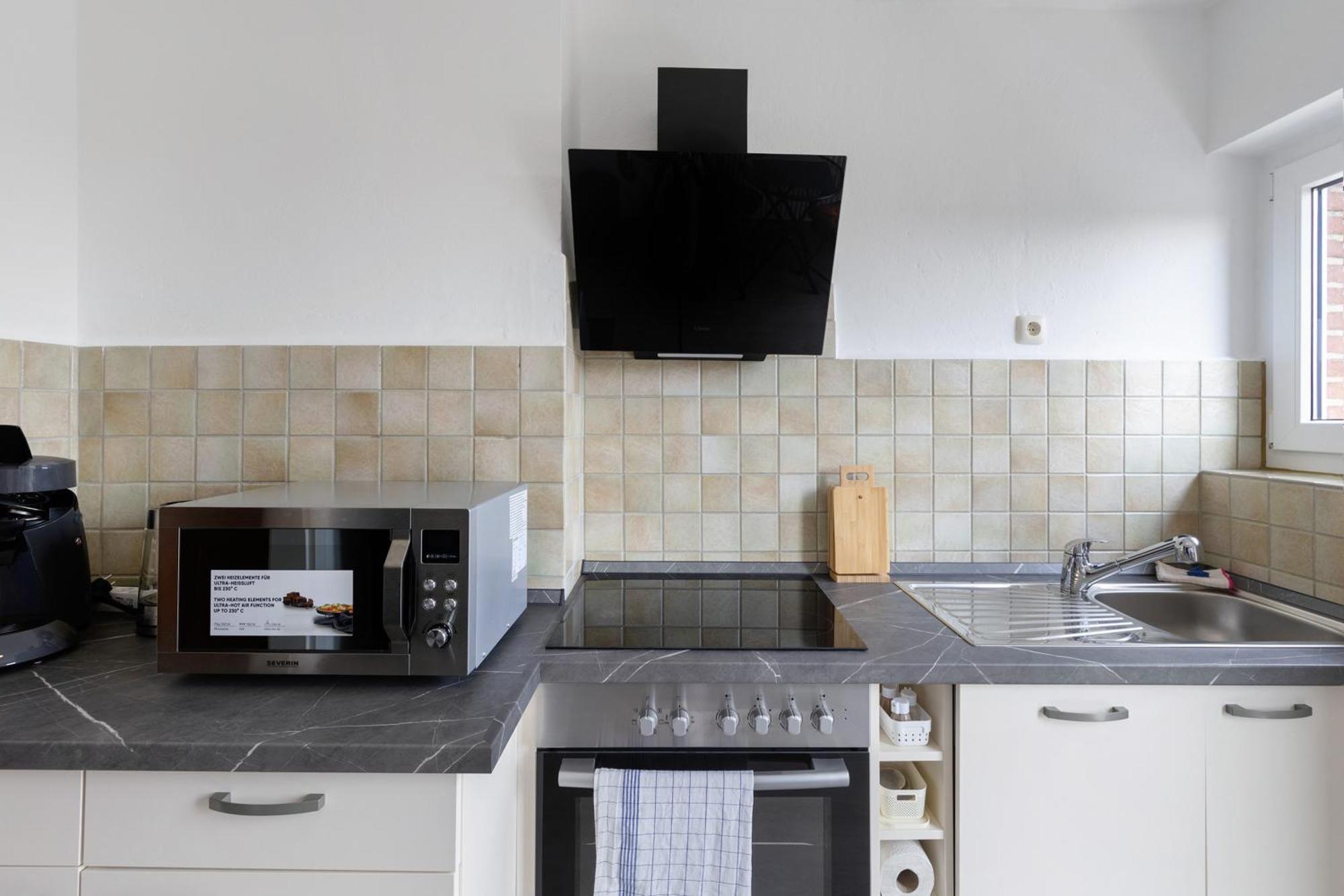 Ruhiges Appartement Am Stadtrand เคเวลาร์ ภายนอก รูปภาพ